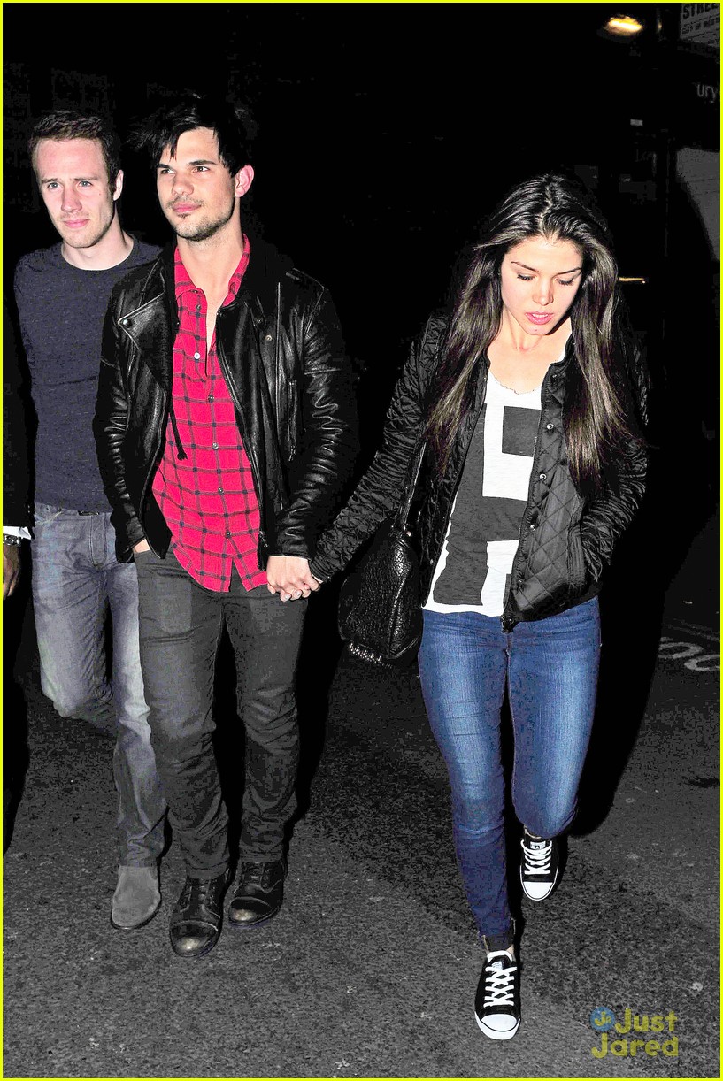 taylor lautner marie avgeropoulos matching jackets london 22